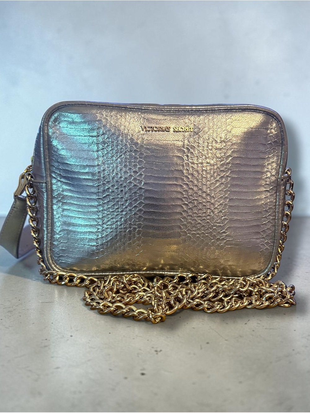 Victoria’s Secret silver snakeskin crossbody bag
